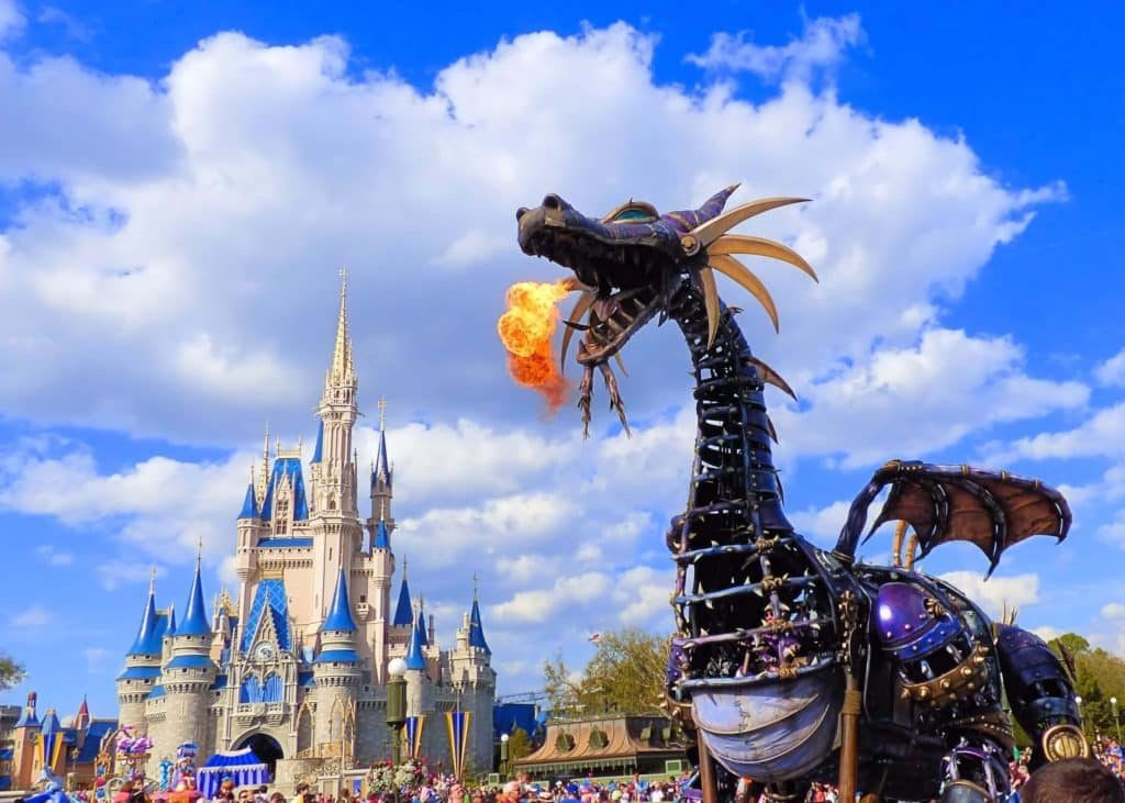 Malefacent dragon float in front of Cinderella's castle at Magic Kingdom