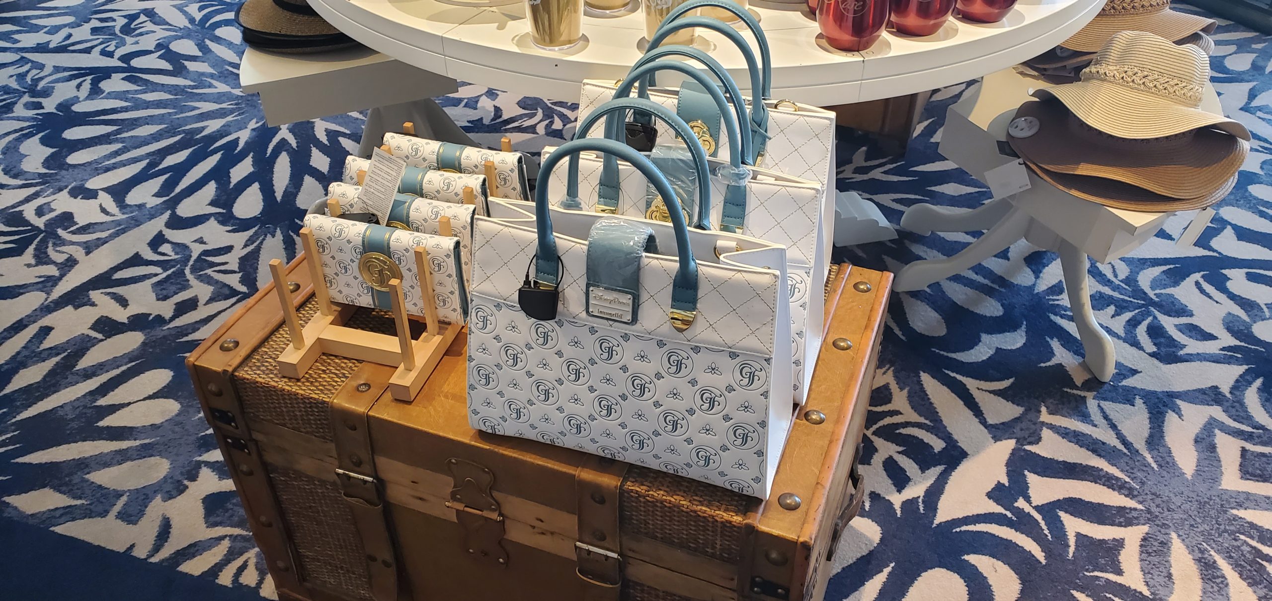 Store display of various purses and clutch bags at Disney World